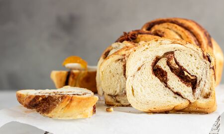 Slices of homemade cinnamon babka or swirl brioche bread. Cinnamon roll bread. Povitica: traditional...