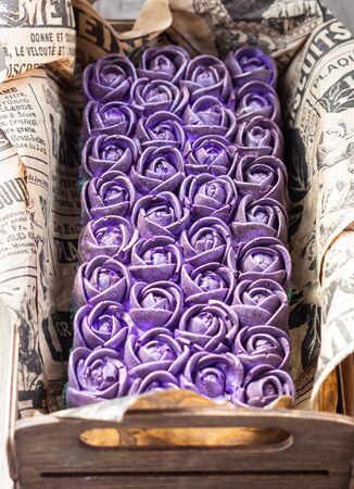 Handmade (craft) purple chocolate roses made with Filipino superfood yam or ube. Chocolate bar.の写真素材