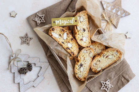 Delicious homemade Italian biscotti cookies in gift box made from craft paper. Idea for perfect sweet gift for Christmas or New Year.の写真素材