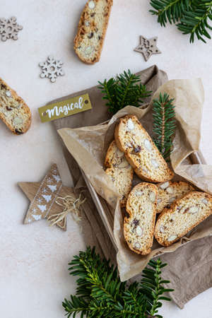 Delicious homemade Italian biscotti cookies in gift box made from craft paper. Idea for perfect sweet gift for Christmas or New Year.の写真素材