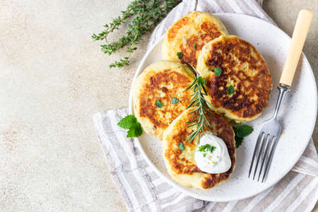 Delicious vegetable cutlets with potato and mushroom served with aromatic herbs and sauce. Healthy...