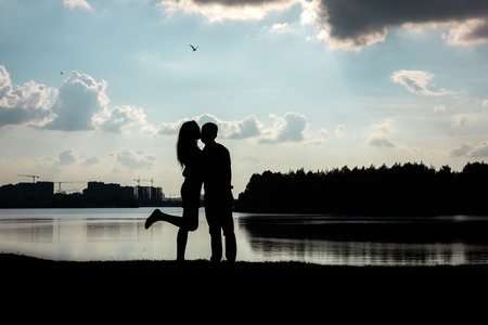 Young girlfunny kissing her menの写真素材