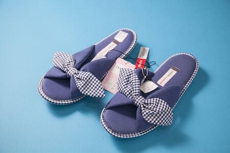 Purple pair of baby girls slippersの写真素材