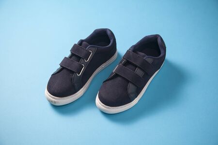 Gray cute pare of baby boy sneakersの写真素材