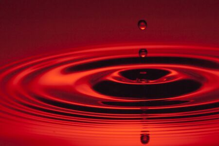 a macro drop of waterの写真素材