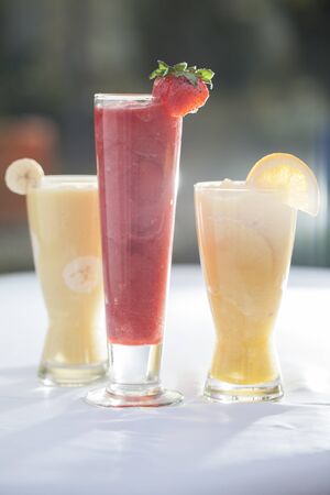 fruit cocktail with ice and lemonの写真素材