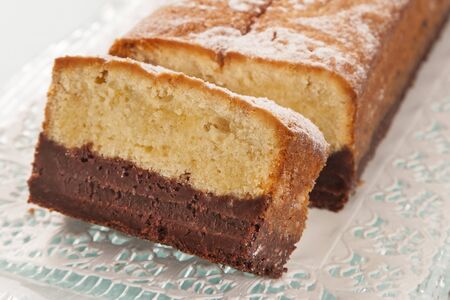 Vanilla cake and chocolate slicesの写真素材