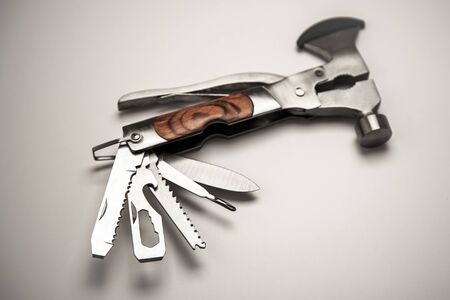Very small multifunction tool with woodの写真素材