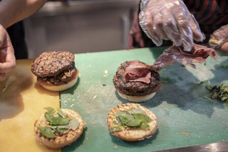 Put the burger on the breadの写真素材