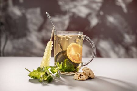Delicious herbal tea with ingredientsの写真素材