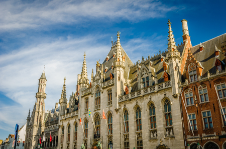 Neogothical building of Province Court - Provinciaal Hof, on the market place in Bruges, Belgiumのeditorial素材