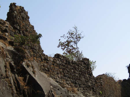 Ruins of a historic stone fort on a hill with panoramic views & birding.のeditorial素材