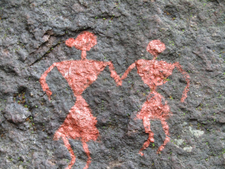 A closeup shot of a couple painted on a stone with a blurred backgroundの写真素材