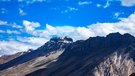 Panoramic view of the Himalayas with mountains and clouds. Ladakh, India.