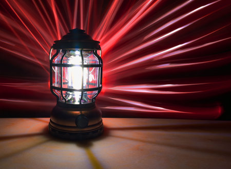 Lantern on a marble table with a white and red light painting effect on the background
