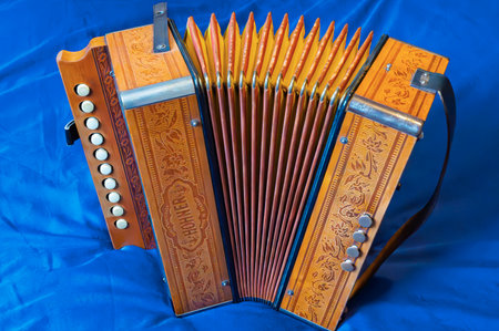 grandfather's accordion on blue backgroundの写真素材