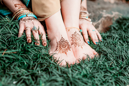 Indian hindu bride with mehendi heena on feet.の写真素材