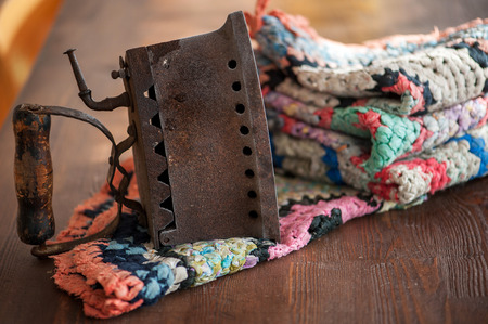 Antique old cordless iron on wood wallの写真素材