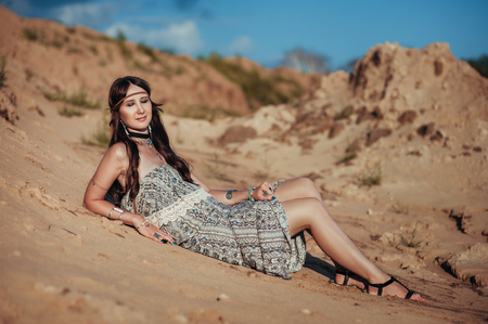 close up of attractive young woman wearing boho accessories.の写真素材