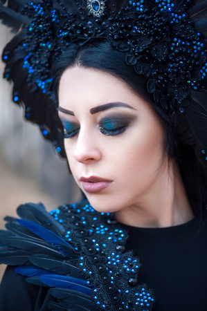 Portrait of a beautiful mysterious woman in the forest.の写真素材