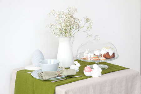 Beautiful Easter table setting with blue plate