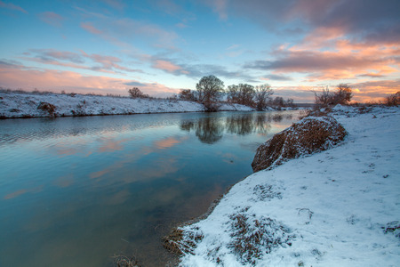 Frosty winter morning on the riverの写真素材