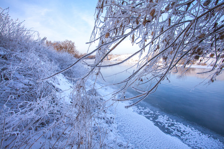 Frosty winter morning on the riverの写真素材