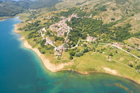panoramic aerial view of the village of mascioni on lake campotosto in the mountain area of gran sasso italyの写真素材