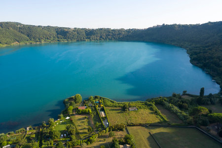 aerial view of nemi lake and in the background the town of genzano di romaの写真素材