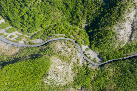 vertical aerial view of the road that crosses the apuan alps in tuscany