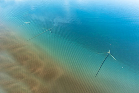 aerial view of three arrow-shaped fishing nets in lake bolsenaの写真素材