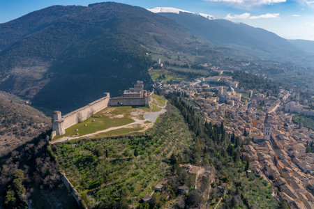 aerial view of the city of assisi umbria with snow covered mount subasioの写真素材