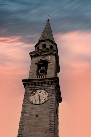 bell tower of the church of san lorenzo in the town of pinzolo trentinoの写真素材