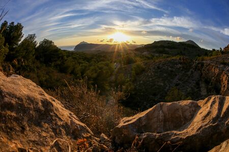 Wide-angle sunset on the valley of the Natural park of Calblanque. Cartagena, Spainの写真素材