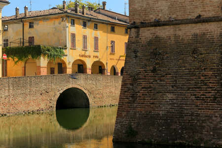 Moat with water out of the Rocca di San Vitale fortress. XV sec. Fontanellato. Parma. Emilia...