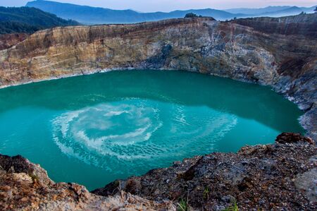 Blue Lake inside of the crater of the Kelimutu-Volcano on Flores island, Indonesia