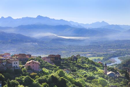 Panoramic view of the Val di Magra with the Magra river and the range of mountain Apennine.の写真素材