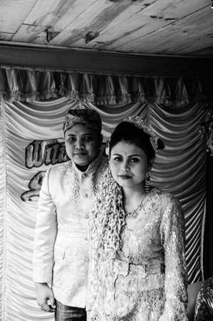 Mount Gede, West Java / Indonesia - June 17, 2010: typical traditional Indonesian Wedding, of the bride and groom portrait. Black and whiteのeditorial素材