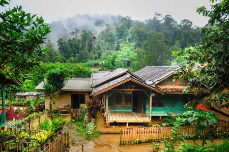 Rural mountain little village with typical Indonesian green house and and little garden on the mount Salak, west Java, Indonesiaのeditorial素材
