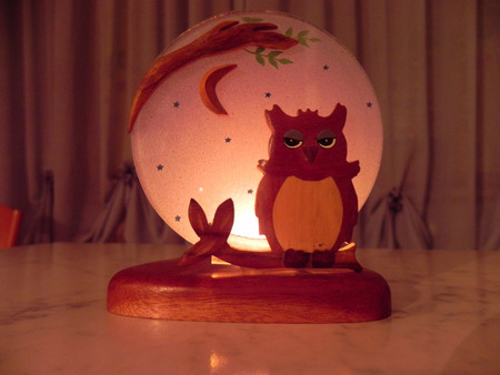 A nice candlestick with owl decorationの写真素材