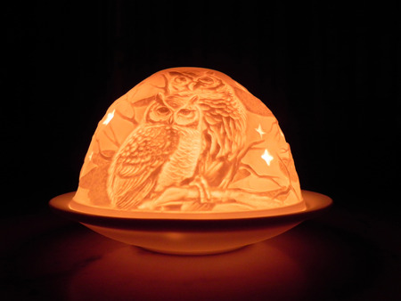 A beautiful candlestick decorated with two owlsの写真素材