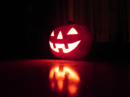 A big pumpkin shining in halloween nightの写真素材