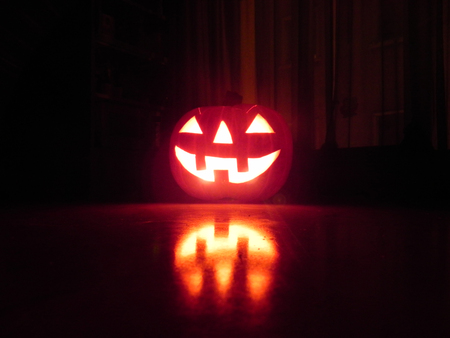 A big pumpkin shining in halloween nightの写真素材