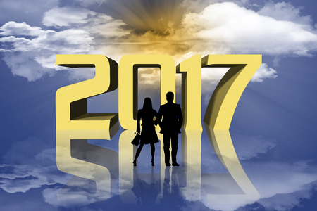 New Year. People watch the New Year. 2017 sky and sun background.の写真素材