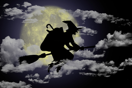 Epiphany, Befana with broom in the night.の写真素材