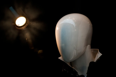 Close up face portrait of a mannequin in a fashion shop window.の写真素材
