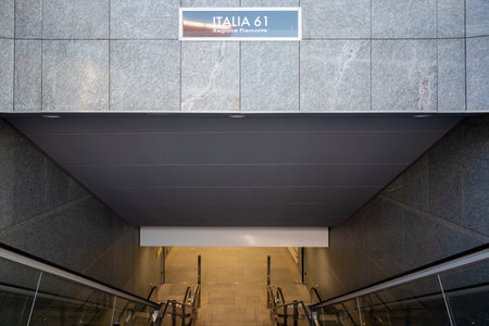 Turin, Piedmont, Italy - August 06, 2023. Metro entrance, Italia 61 station, Piedmont region.