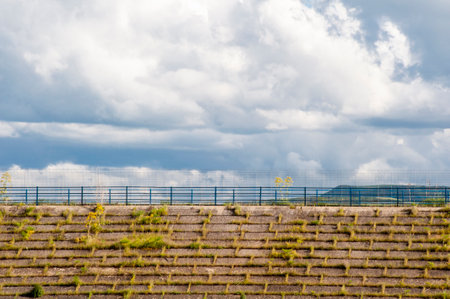 Alta Murgia, panorama of the park with meadow, blue sky, clouds, farmhouses. Horizon of the green hills in Puglia, nature Italy.の写真素材