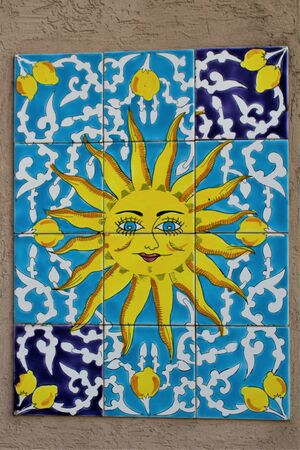 image depicting the sun smiling to represent the solar Sicily in Italyの写真素材
