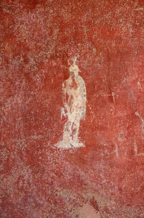 Pompeii, Italy, June 26, 2020 detail of a fresco of a Roman house with the classic Pompeii red colorのeditorial素材